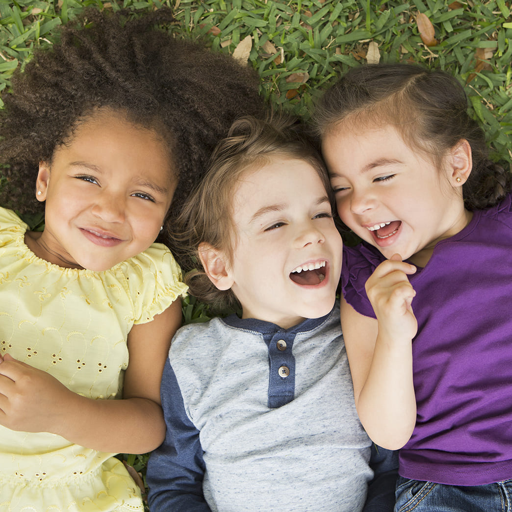happy kids on grass happy kids on grass